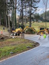 Workers completing repair