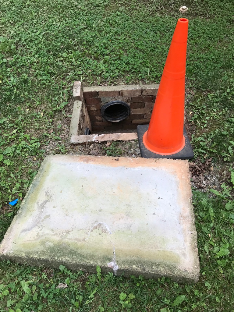 Manhole opened for storm water inspection
